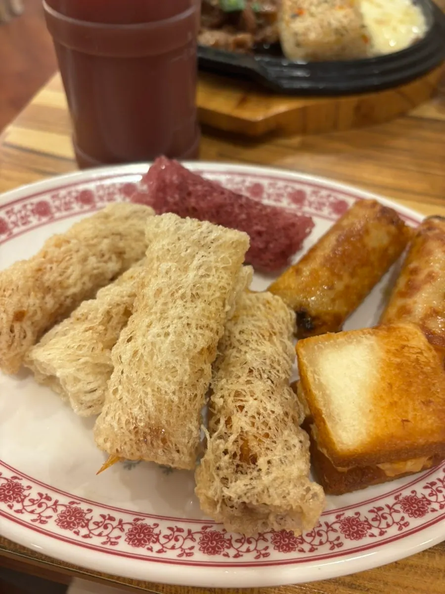 Mixed cha gio served alongside the pho