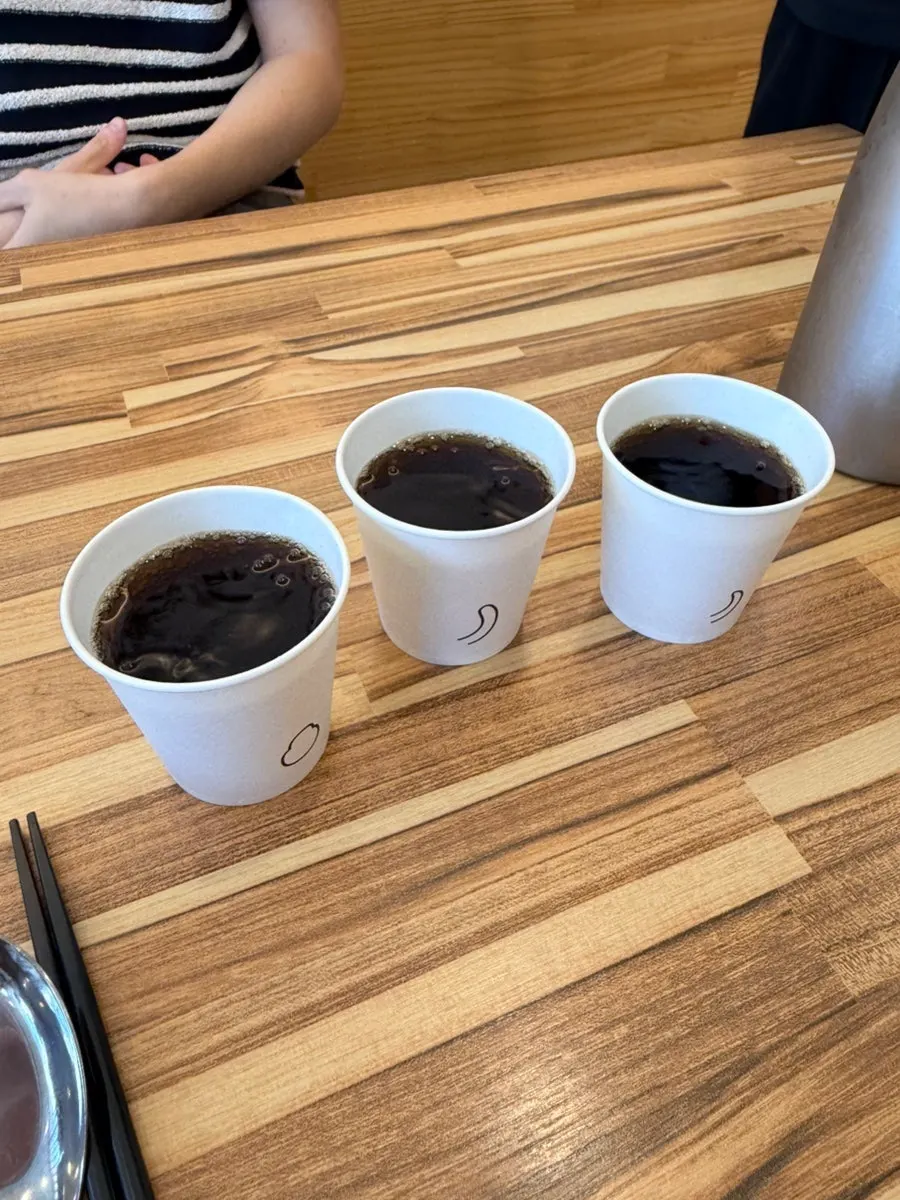 Back of the Wolmidang paper cup with a tail detail