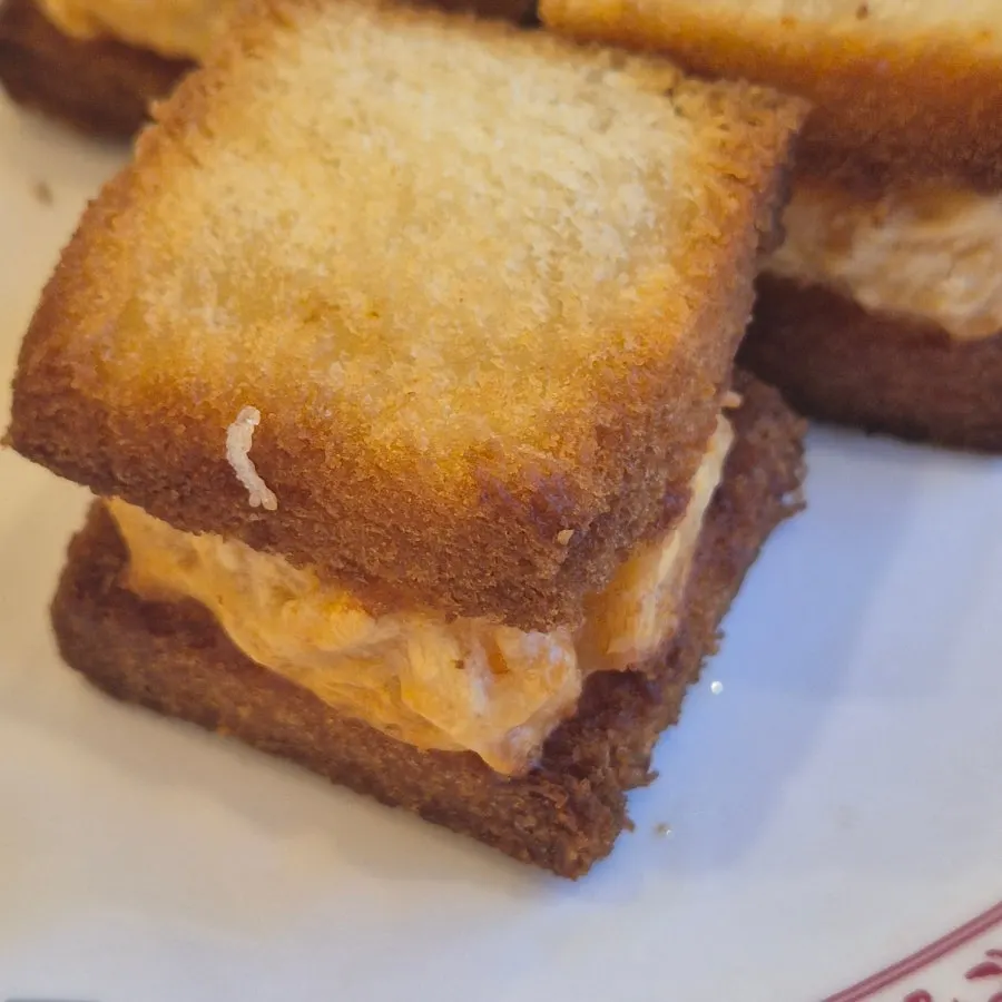Three pieces of crispy fried menbosha