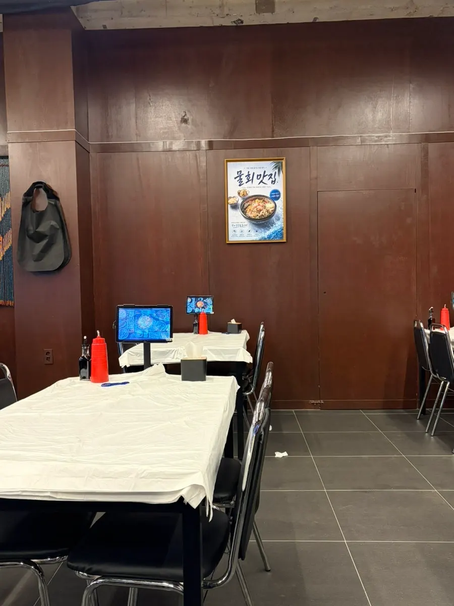 Spacious dining hall with black-tone interior