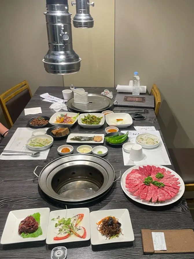 Separated room seating and grill table