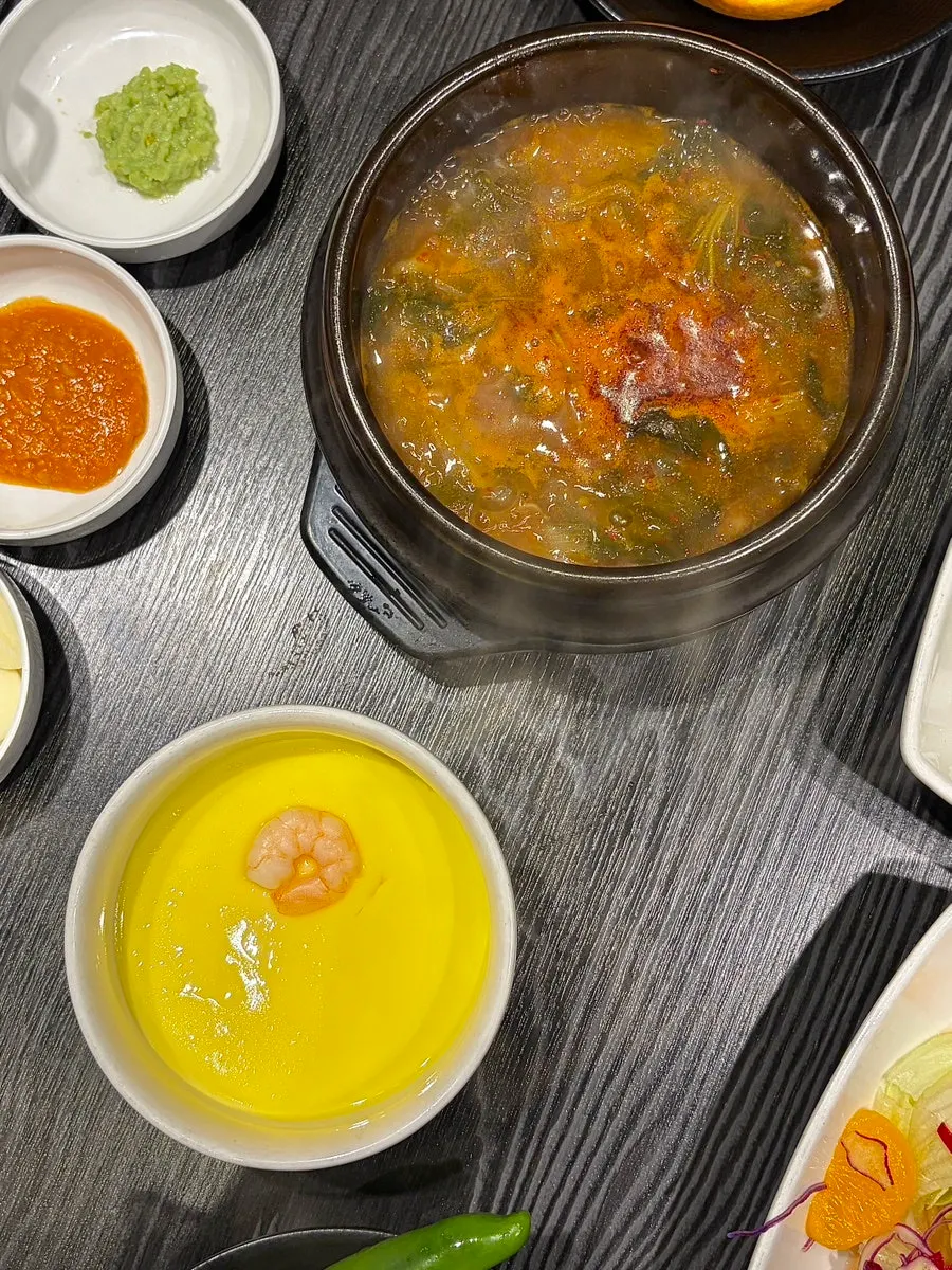 Steamed egg and seasoned crab among the side dishes