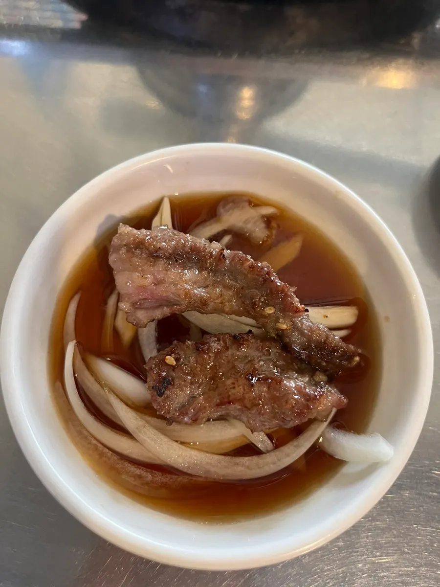 Marinated sogalbisal grilling on the charcoal grate