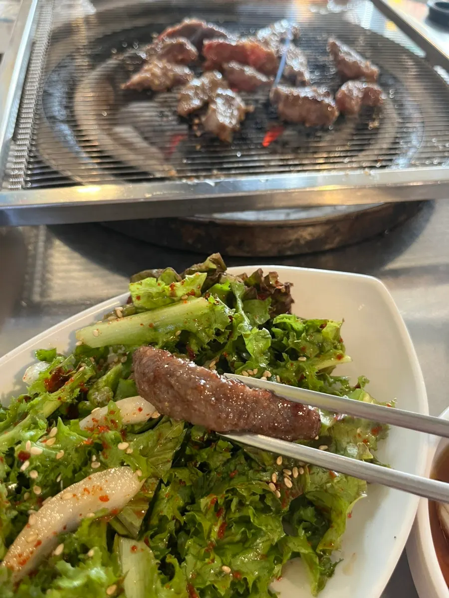 Well-cooked marinated sogalbisal placed in onion sauce