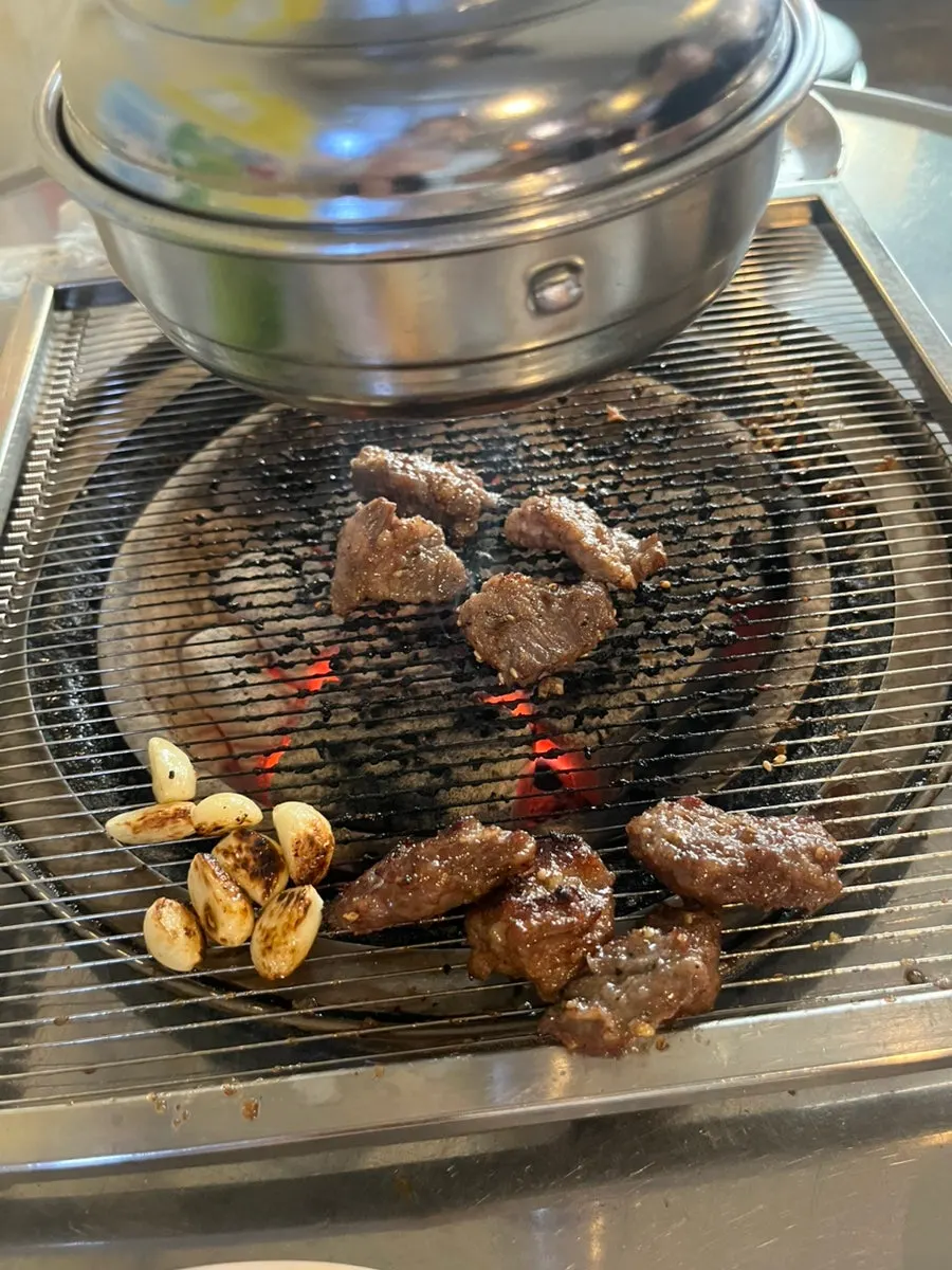 Garlic from the self-serve bar grilled over charcoal