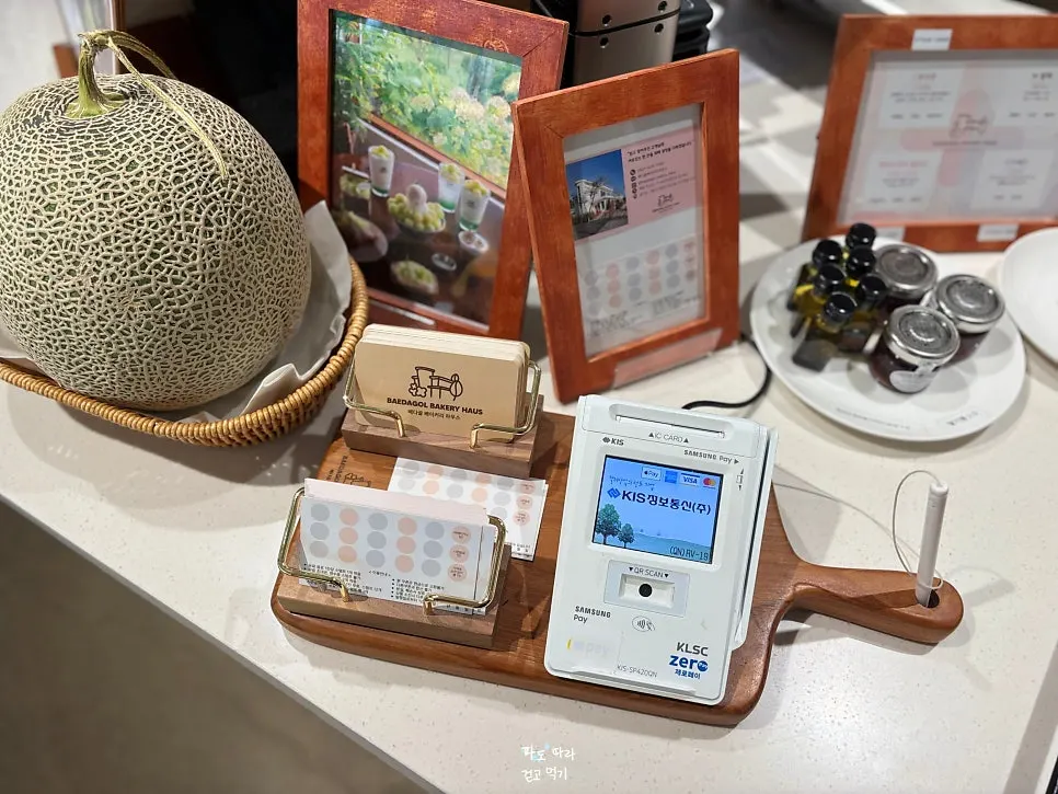 Coupons and business cards on the counter