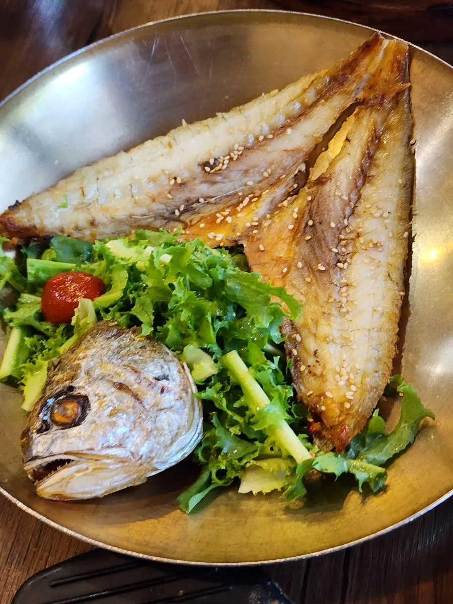 Korean set-meal side dishes including bellflower root and namul