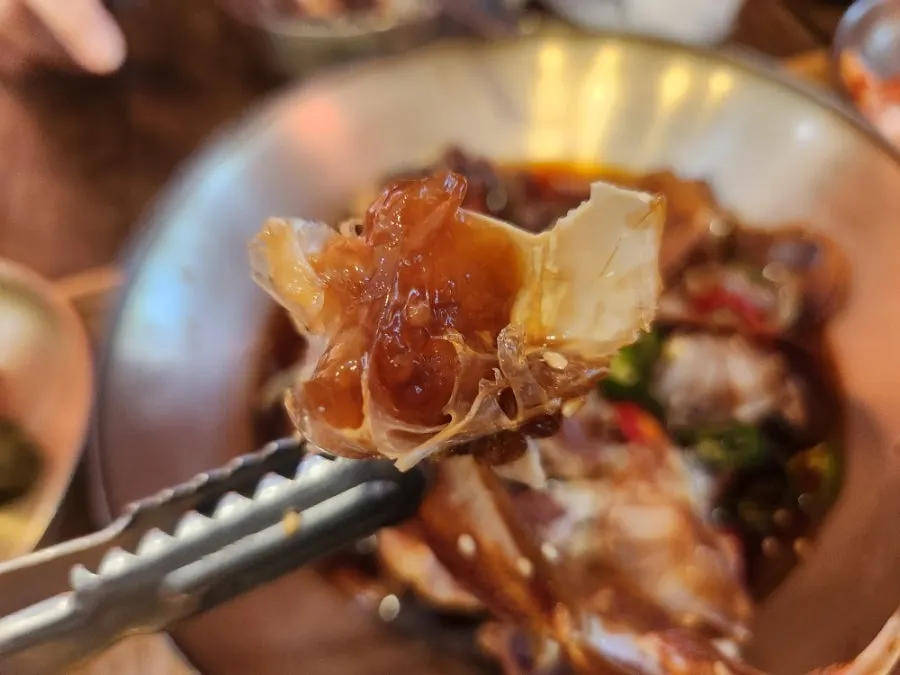 Close-up of ganjang gejang packed with crab meat