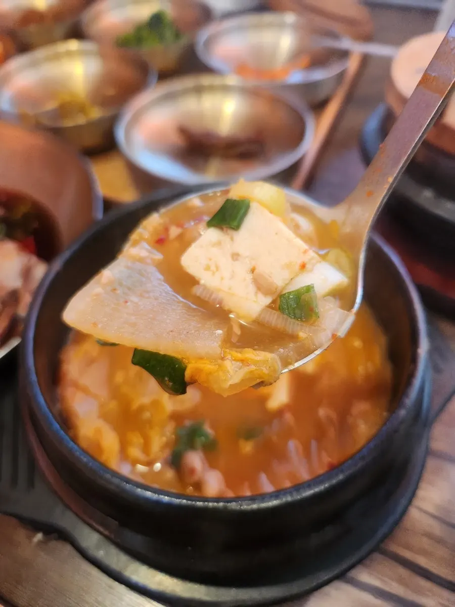 A spoonful of cheonggukjang scooped up