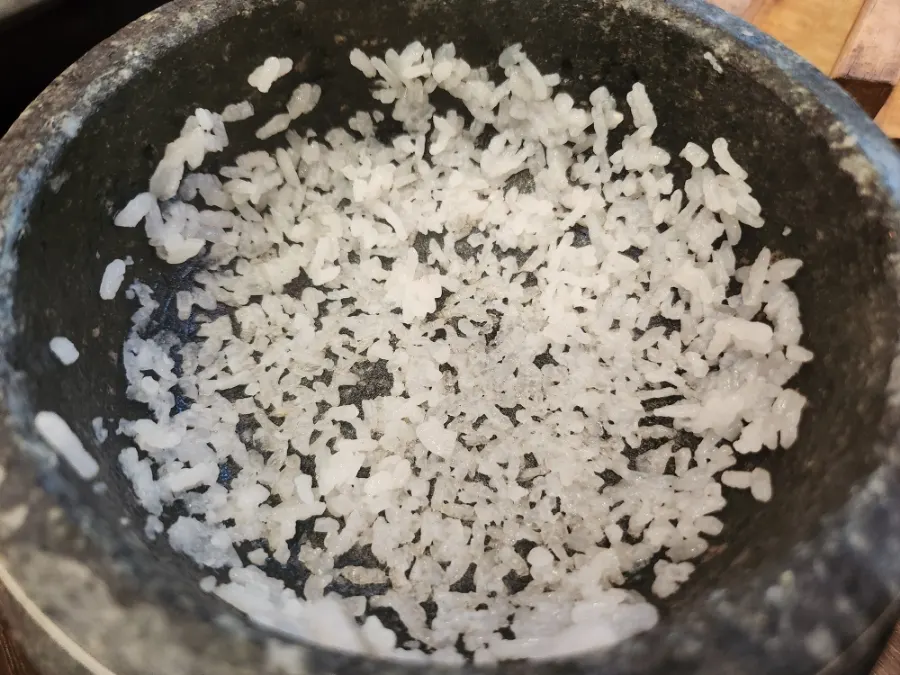 Freshly cooked stone-pot rice served with side dishes