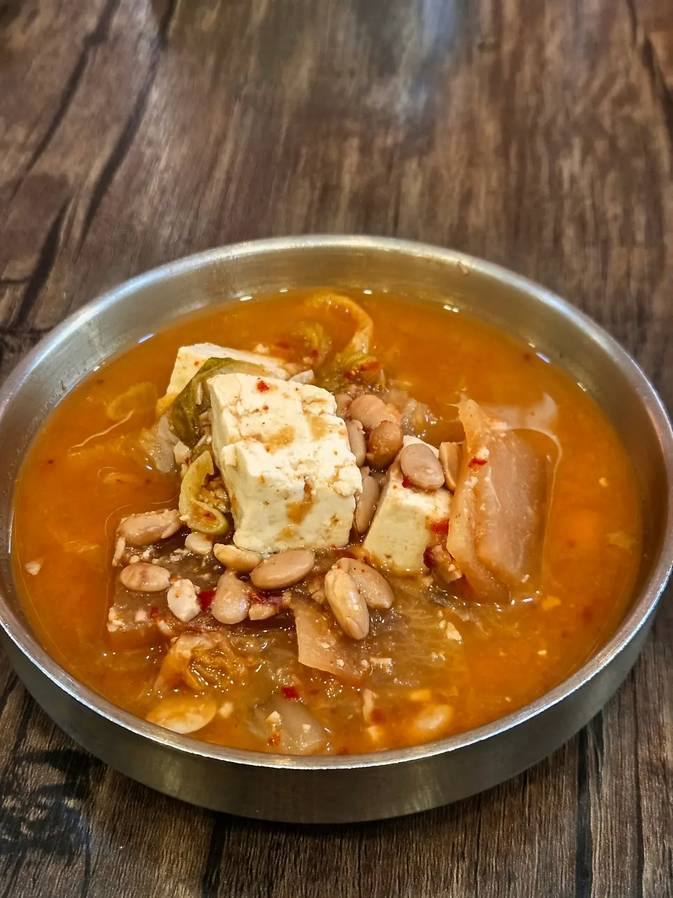 Cheonggukjang broth with solid ingredients mixed in