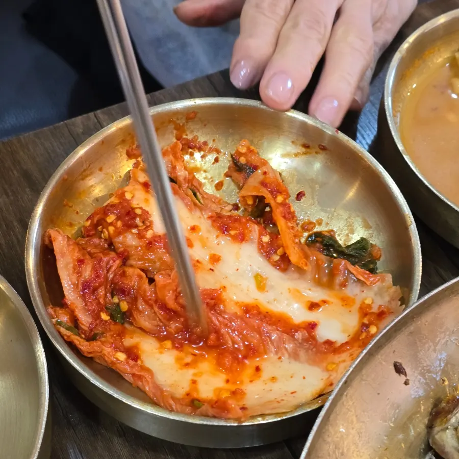 The kimchi from Kim Myeongju Tteuranchae Bapsang, refilled three times