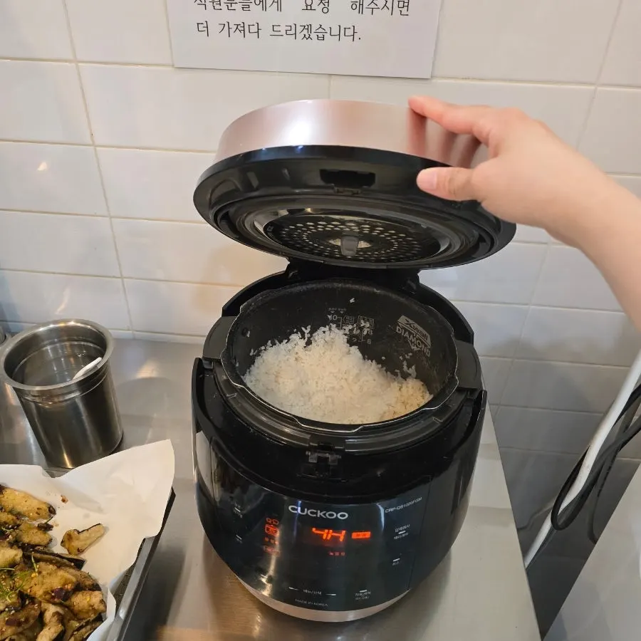 Scorched rice at the bottom of the stone pot after water was added