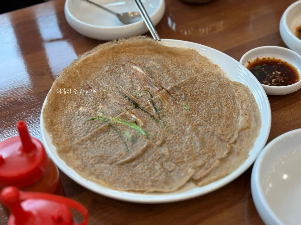 Two pieces of buckwheat pancake served together