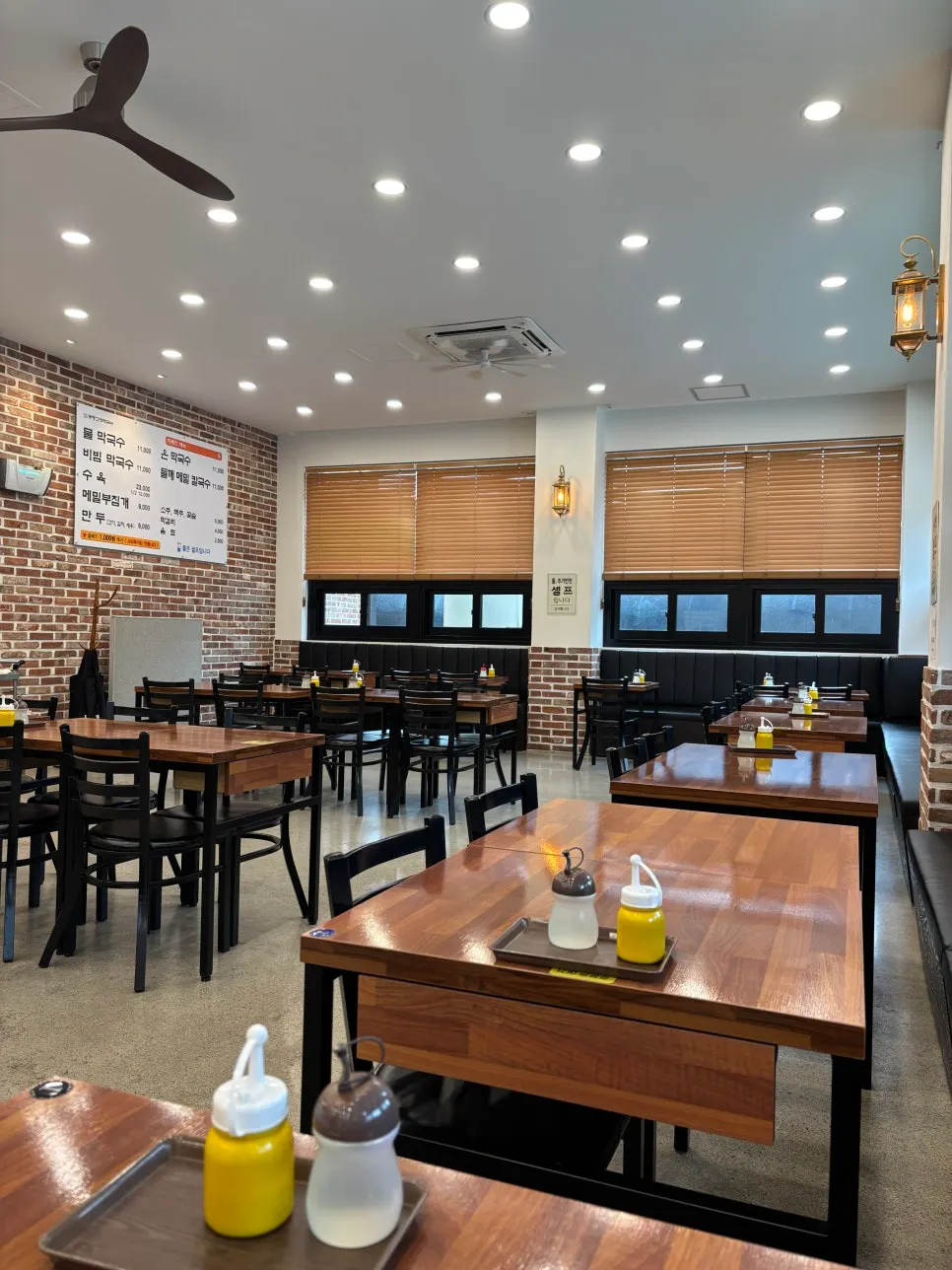 Interior of Bongpyeong Gohyang Makguksu with many tables