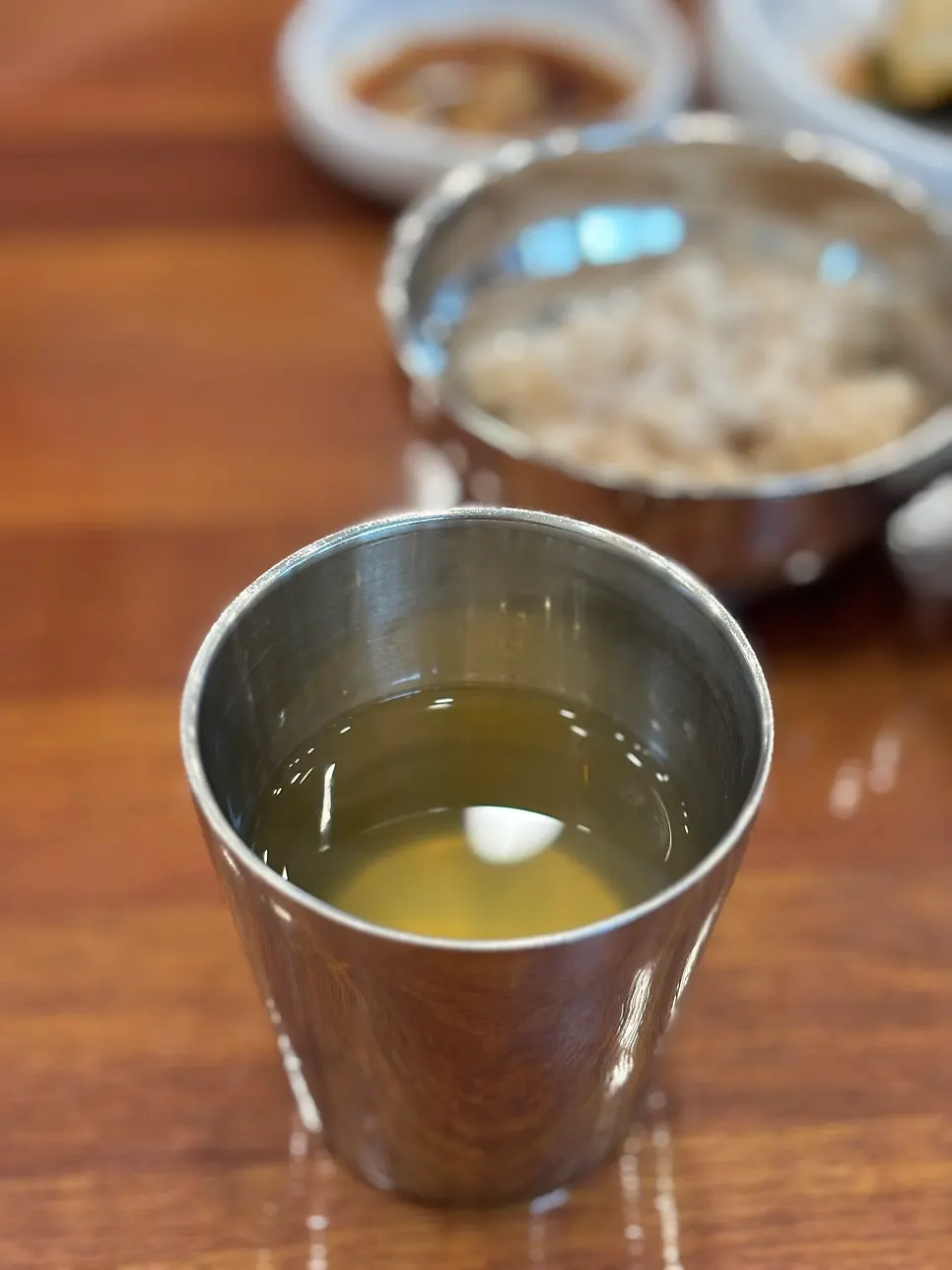 Buckwheat noodle water poured into a cup