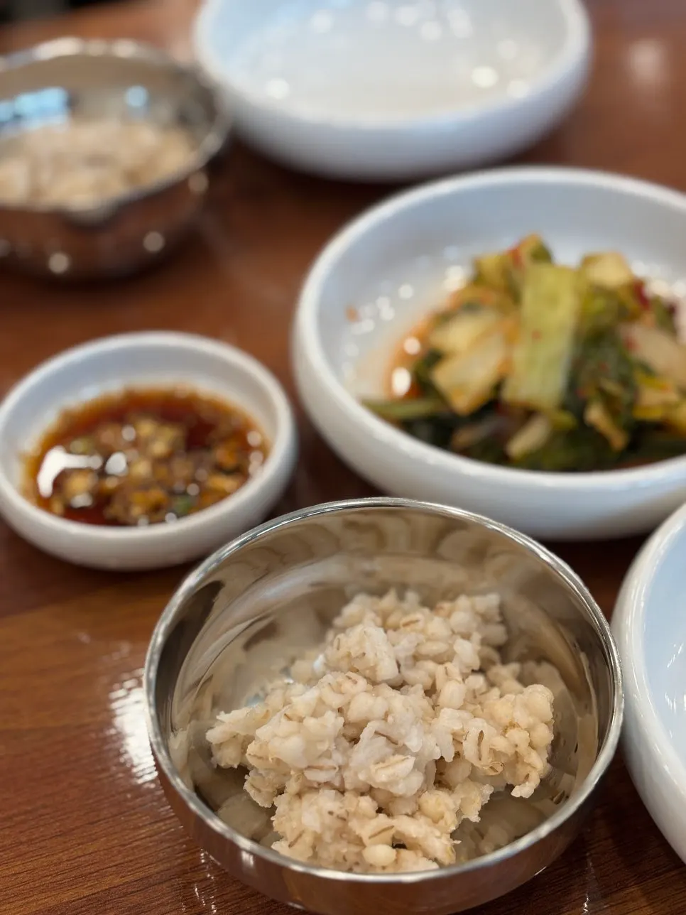 Sesame oil and gochujang set out on the table