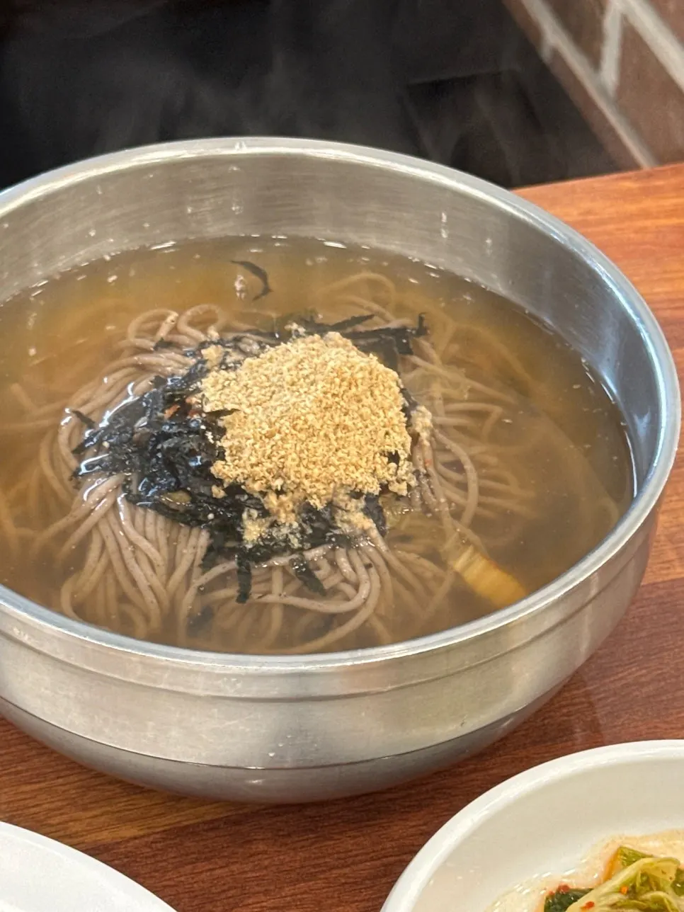 Warm makguksu enjoyed on a chilly day