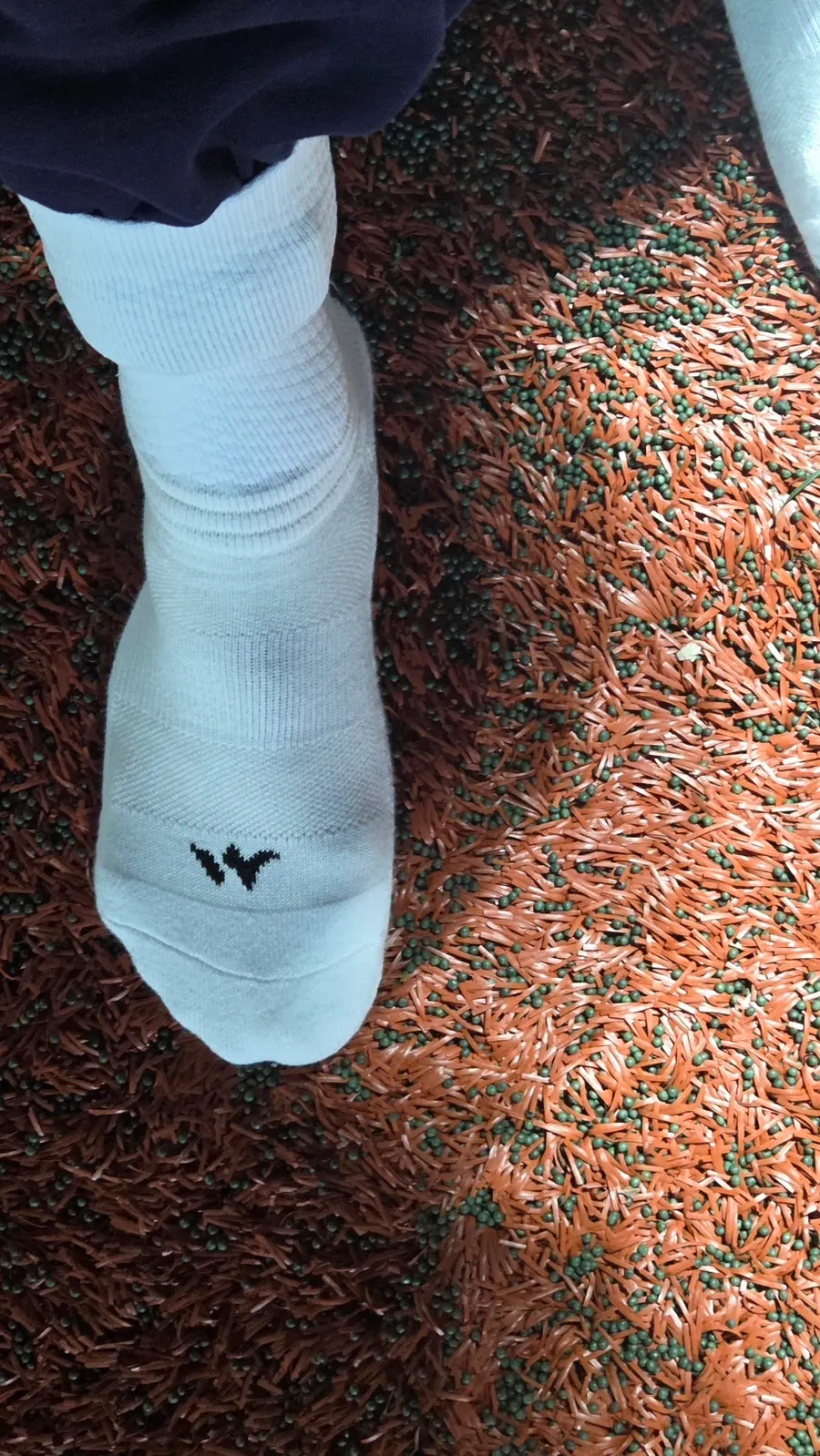 Oneable sports socks worn by a boyfriend while playing soccer
