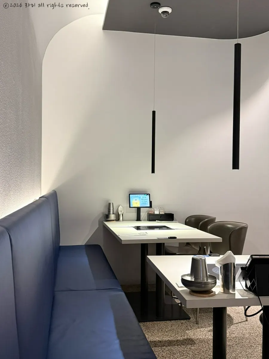 Hall seating with sofa seats and marble tables