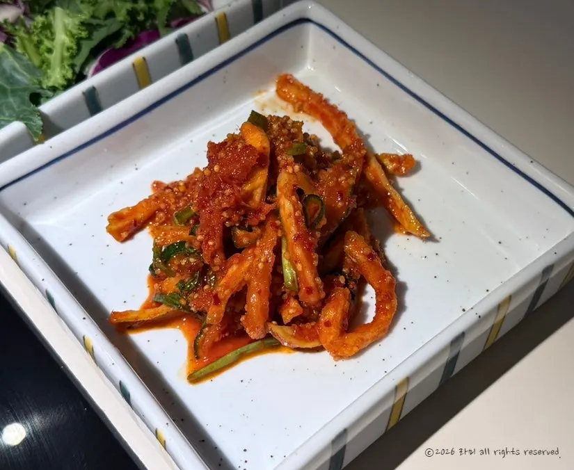 Basic side dishes on square porcelain plates