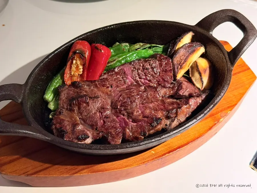 Premium hanwoo chaekkeut sirloin seared on a cast-iron pan