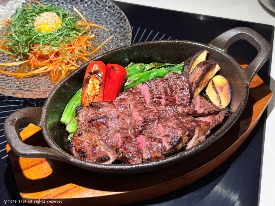 Hanwoo sirloin wrapped with scallion salad