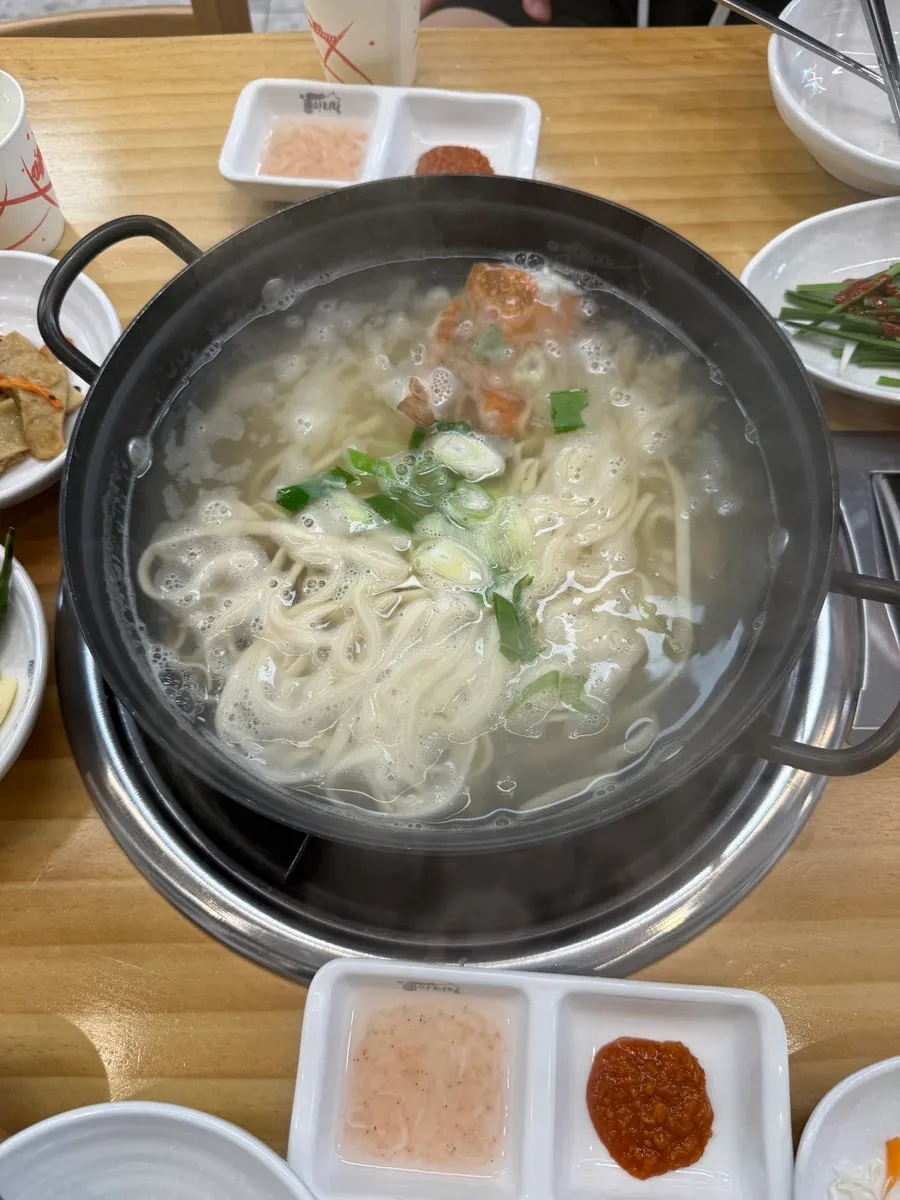 A bite of bossam wrapped in cabbage