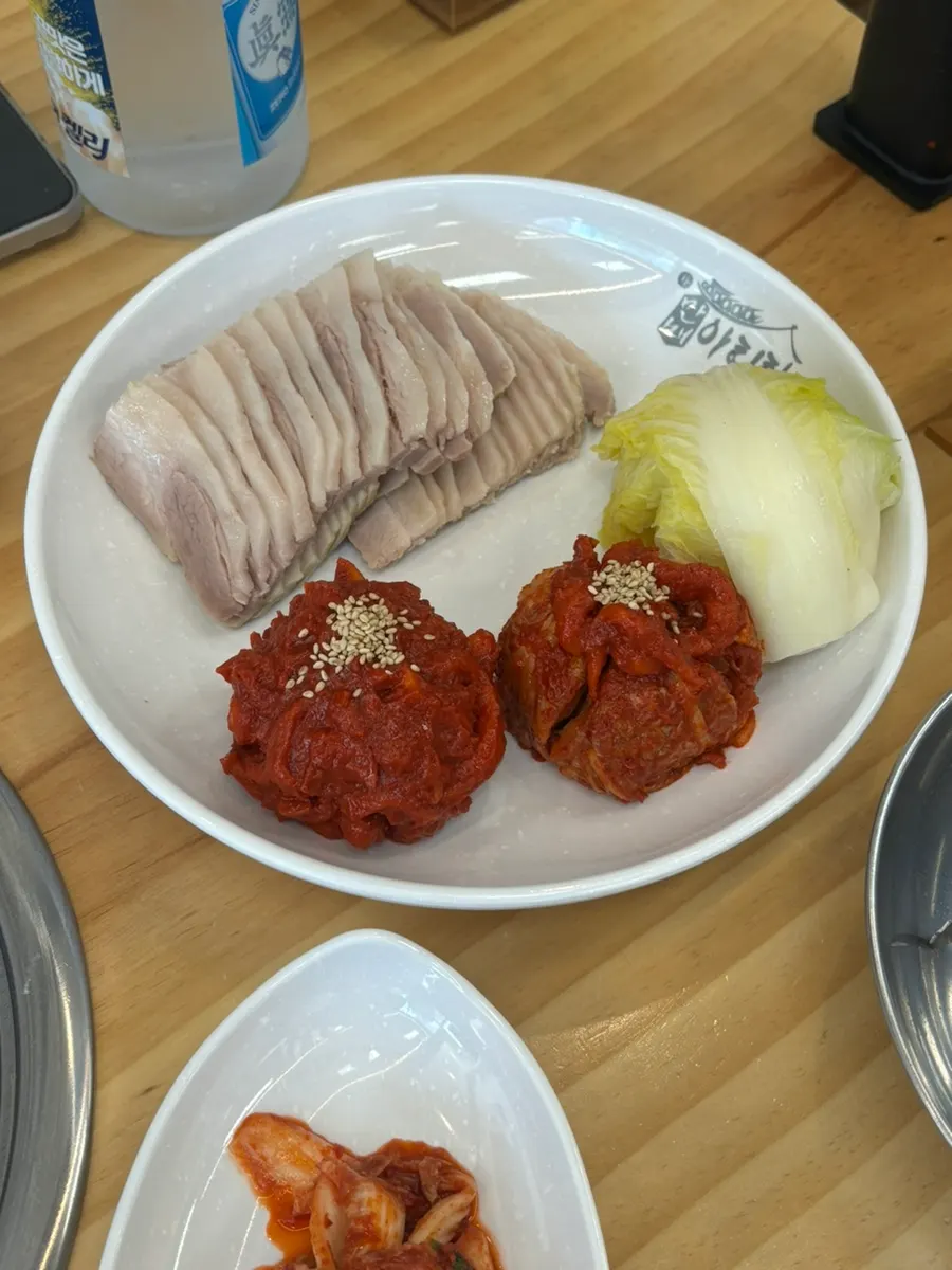 Small dishes of ssamjang and salted shrimp