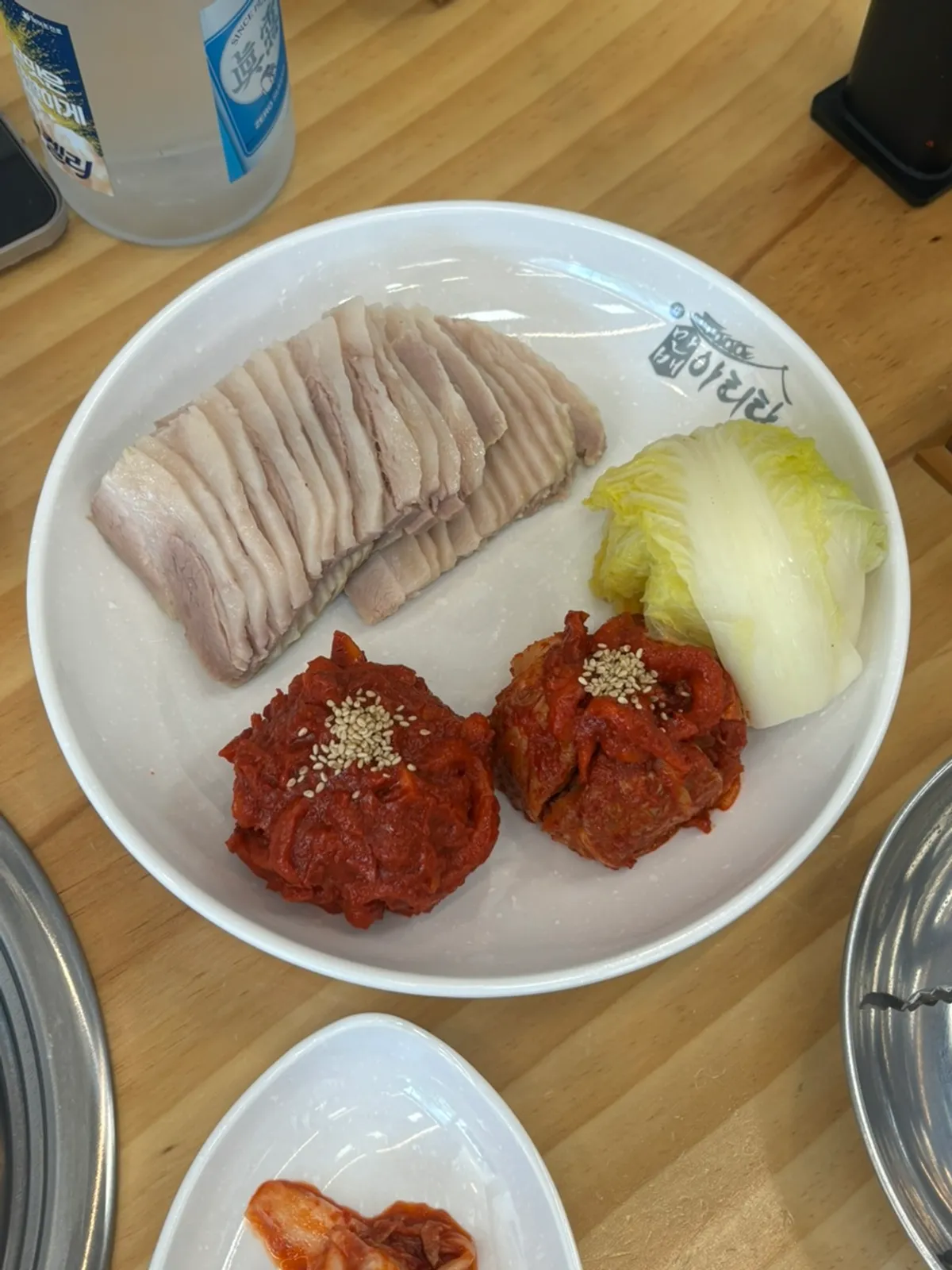 Half-and-half bossam small size served with cabbage and kimchi