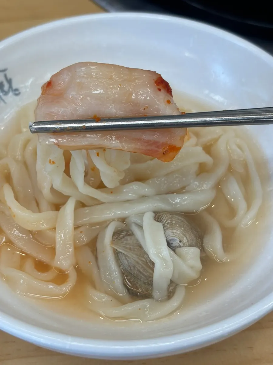 Spicy, refreshing clam kalguksu broth