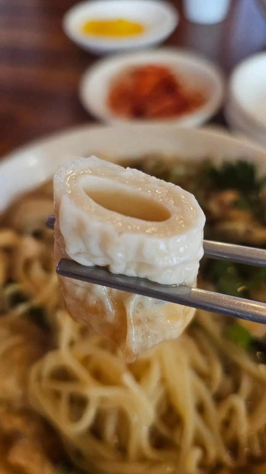 Udon broth loaded with green onion