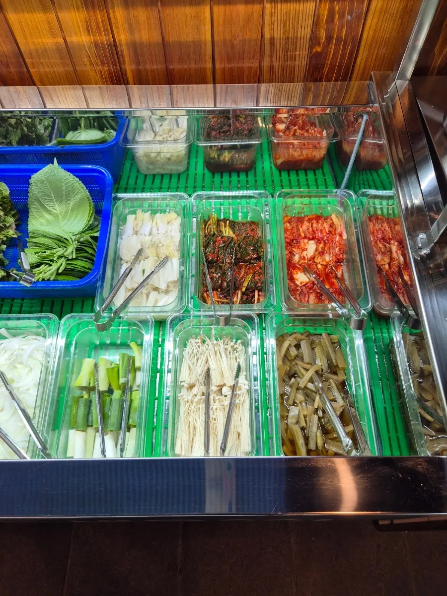 Table set with wrap vegetables and kimchi