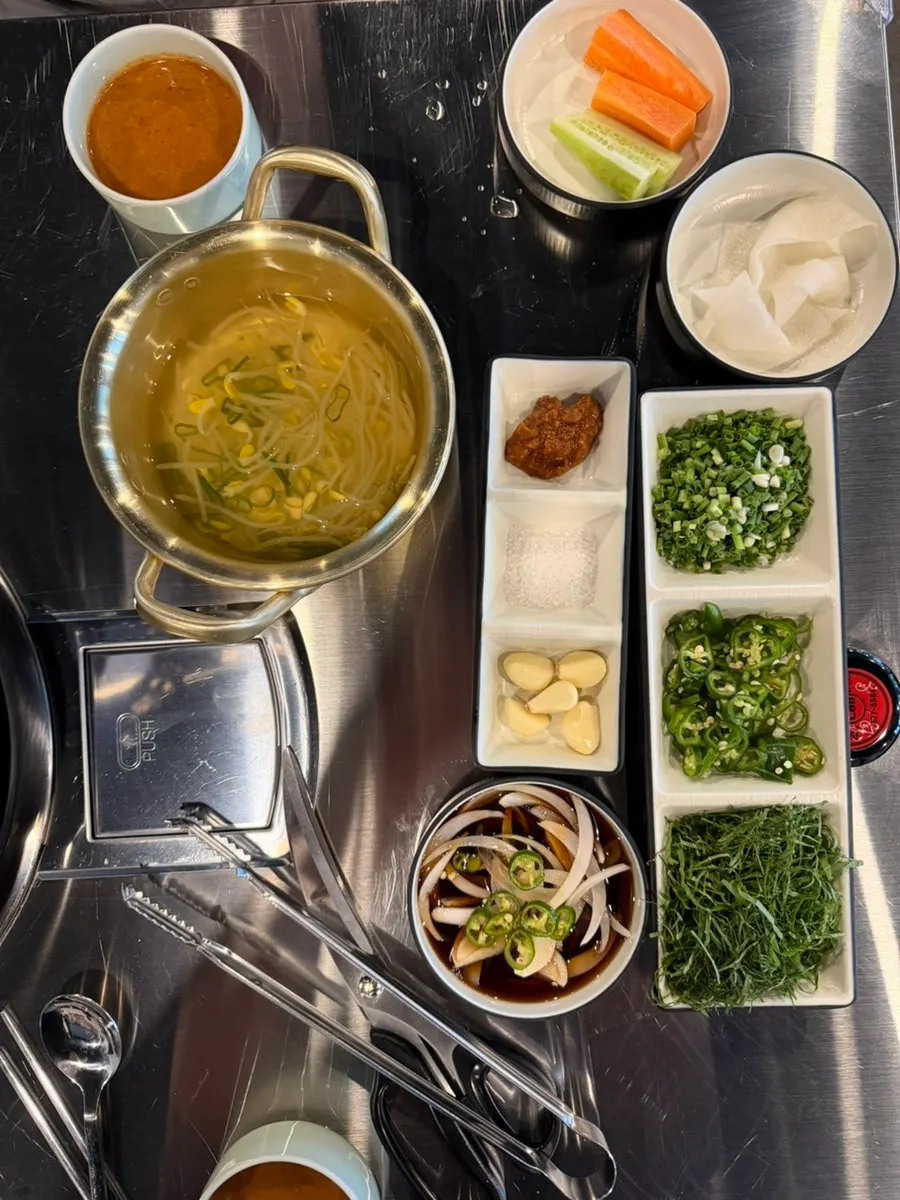 Basic side dishes and bean sprout soup at the makchang restaurant