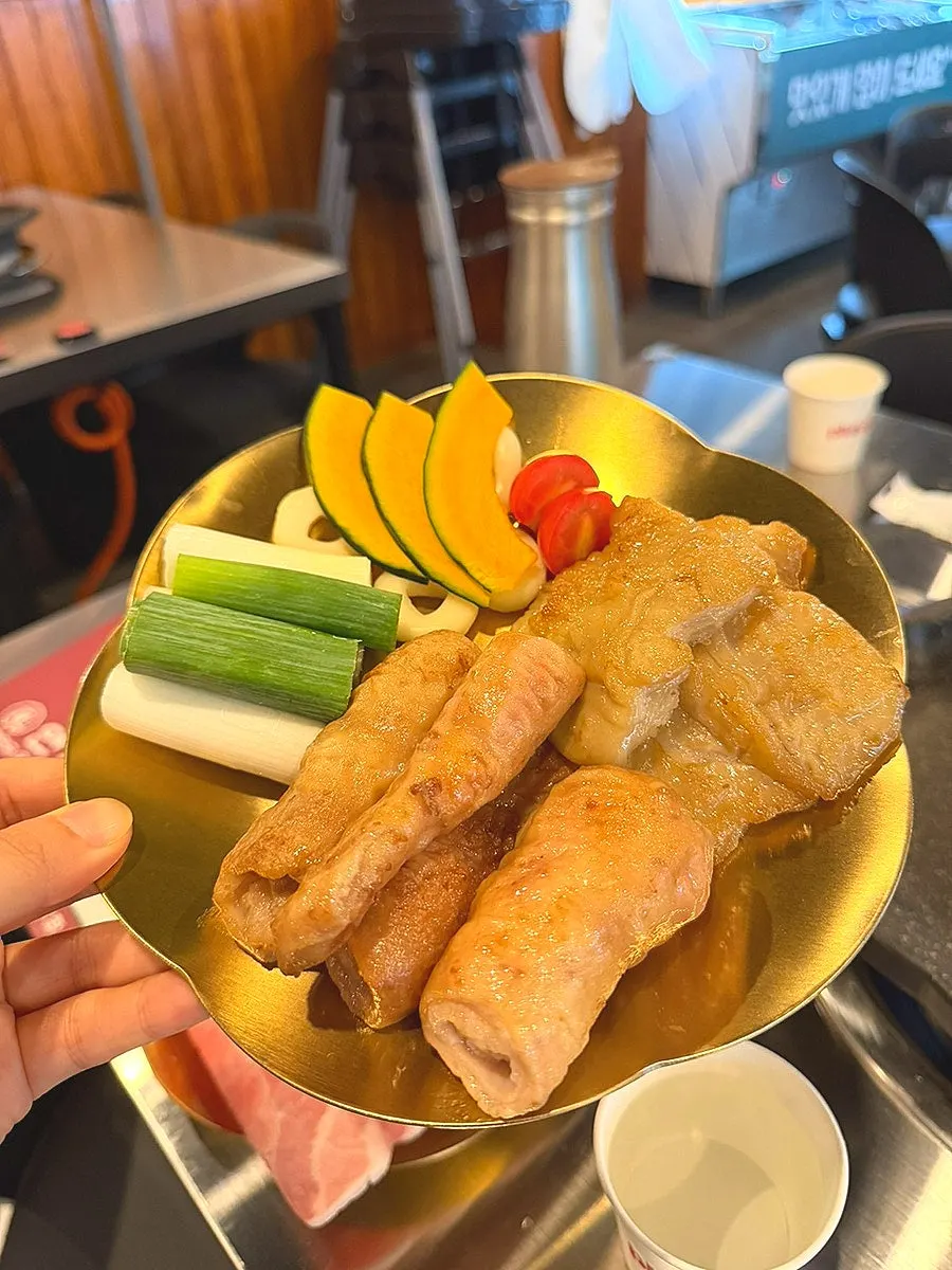 Self-serve bar with green onion kimchi and lettuce wraps
