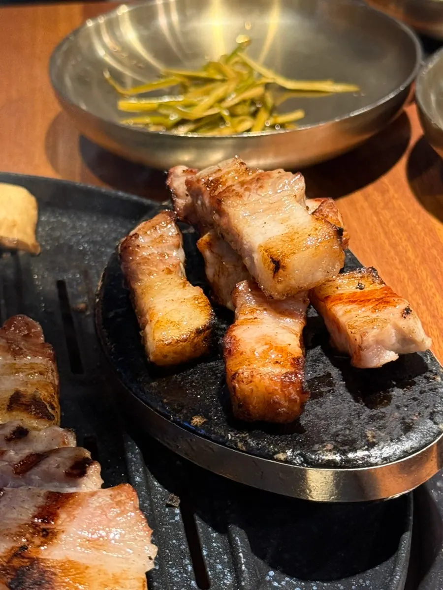 Samgyeopsal paired with the jjolmyeon scallion salad