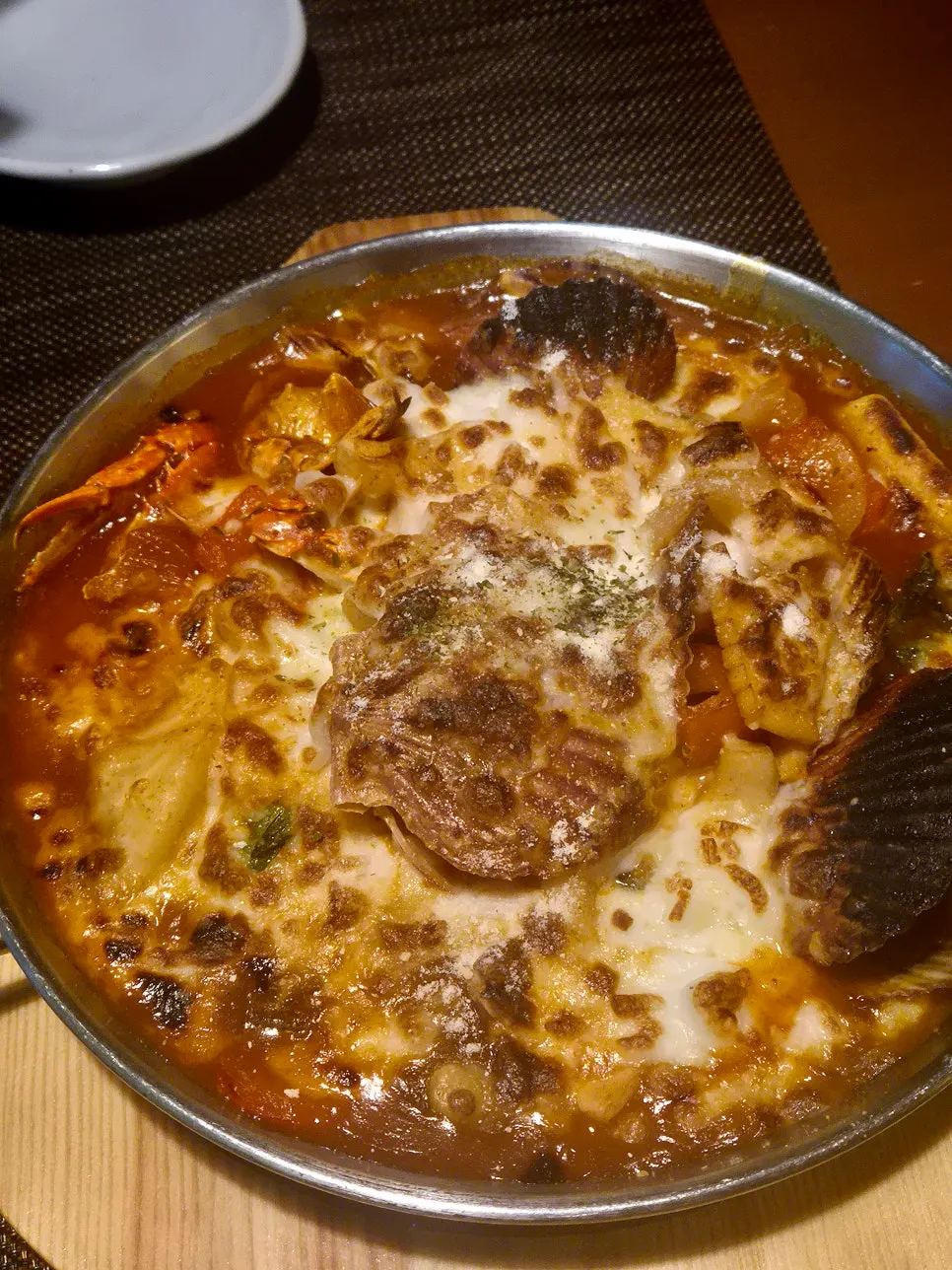 Seafood cheese tteokbokki topped with cheese
