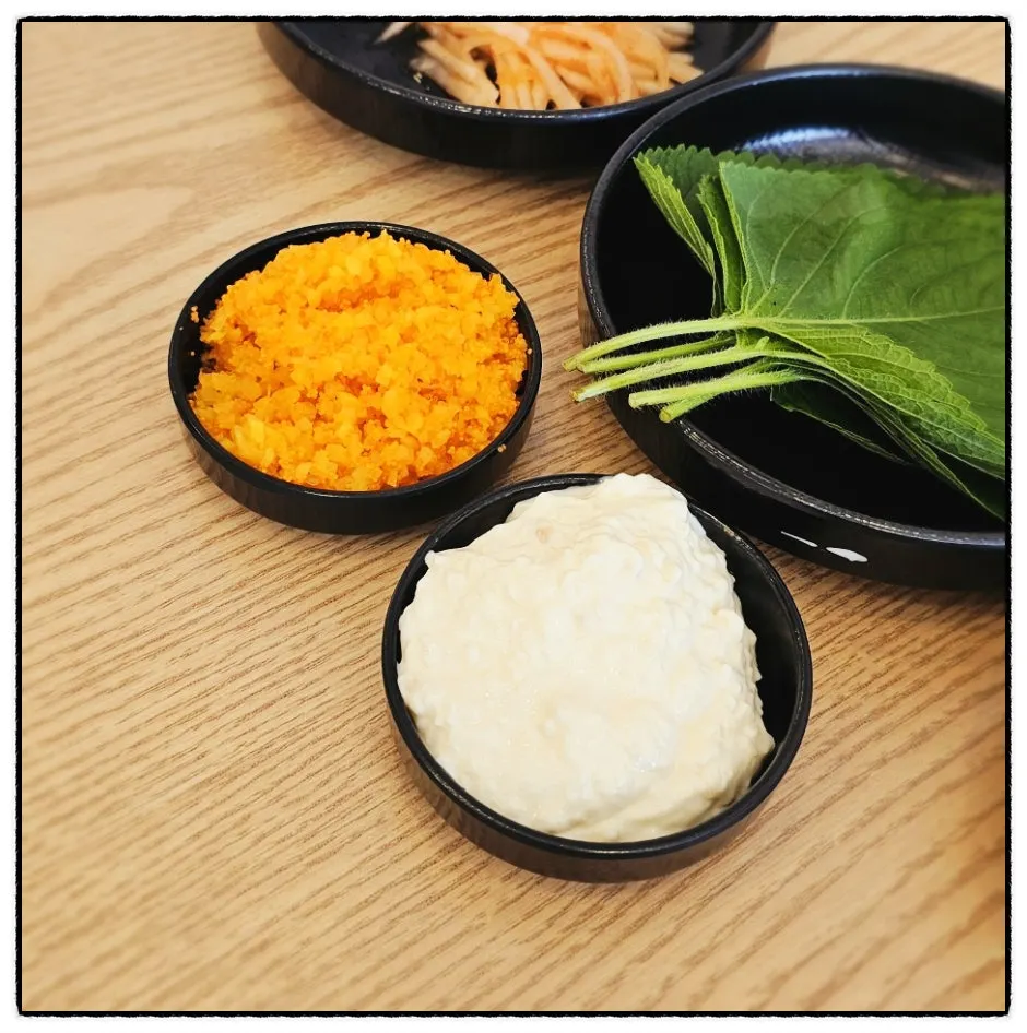 Flying-fish-roe pickled radish and garlic-mayo side dishes