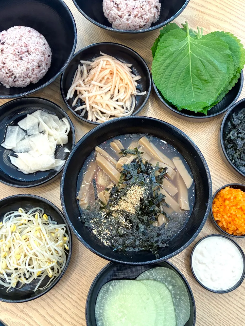Side menu signage for charcoal galbi and dumplings