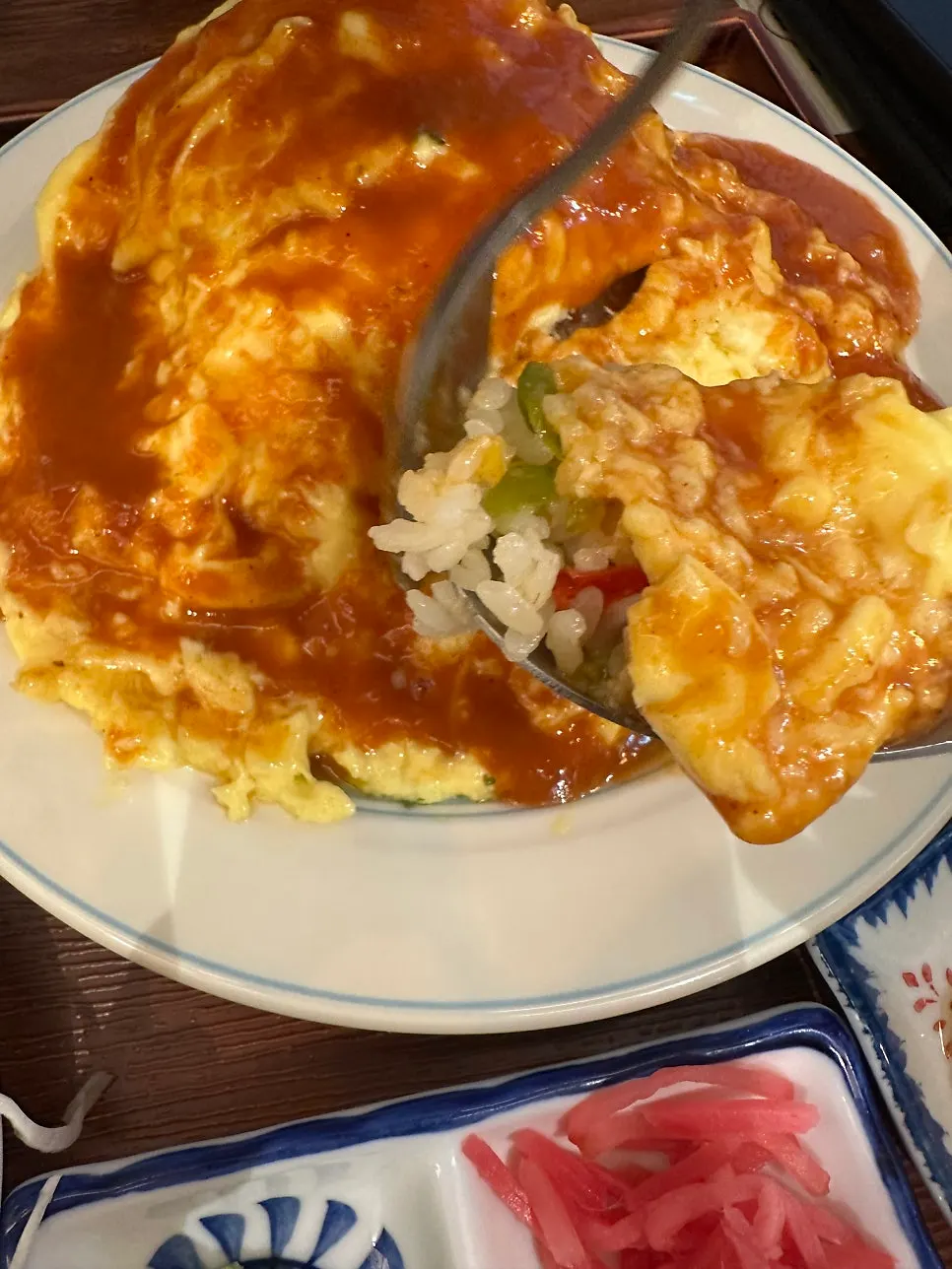 Hamburg steak revealed inside the omurice