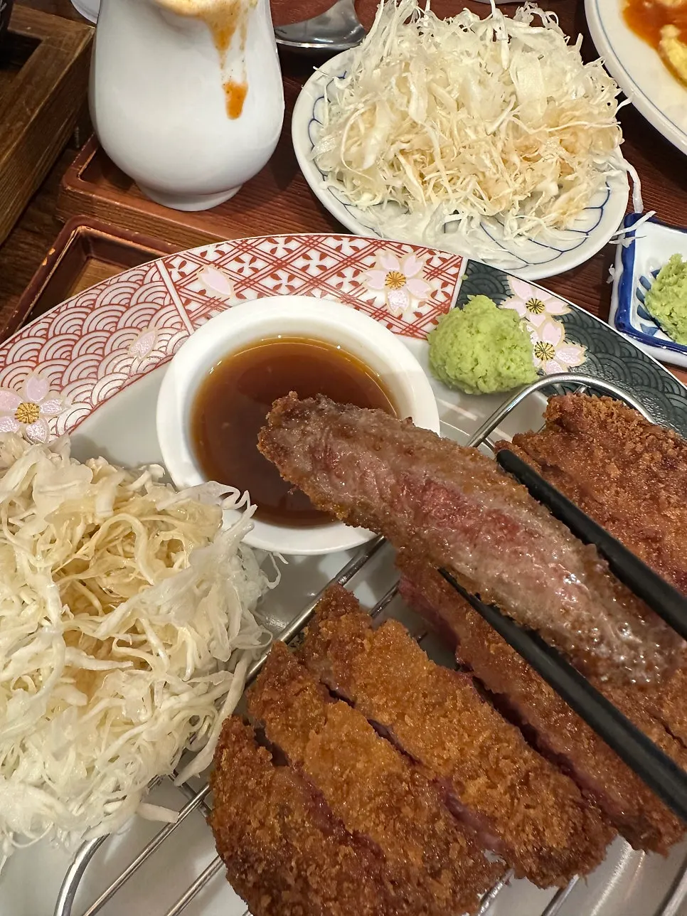 Piece of gyukatsu on the tabletop grill