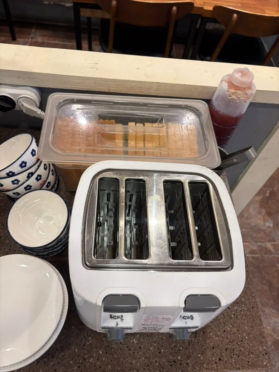 Self-serve bar with soup, broth, and toast