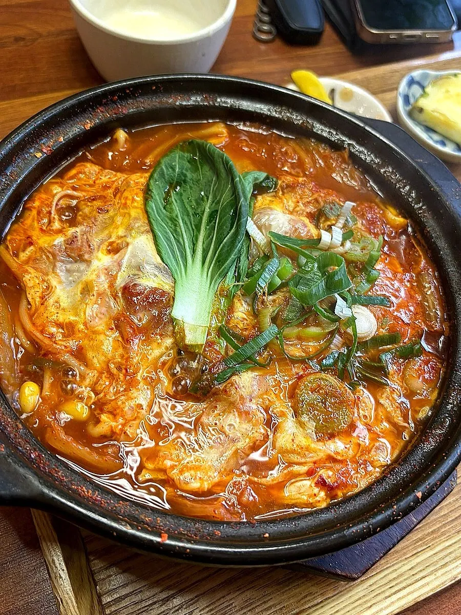 Close-up of kimchi nabe with bean sprouts and egg