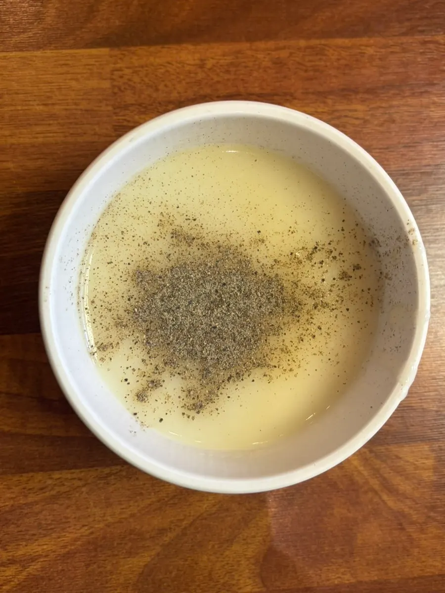 Self-bar broth with fried batter crumbs and dried seaweed flakes at Wonkwang Katsu