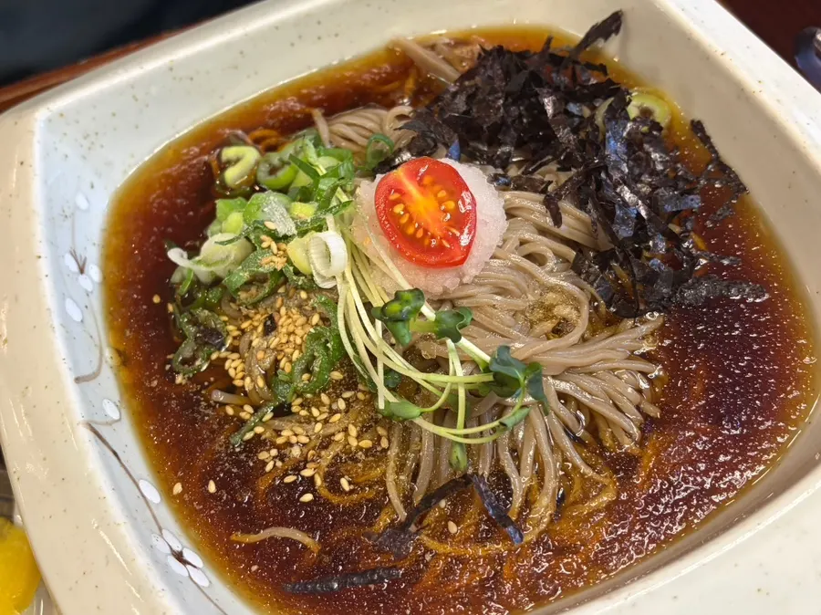 Buckwheat noodles dipped in tsuyu mixed with fresh wasabi