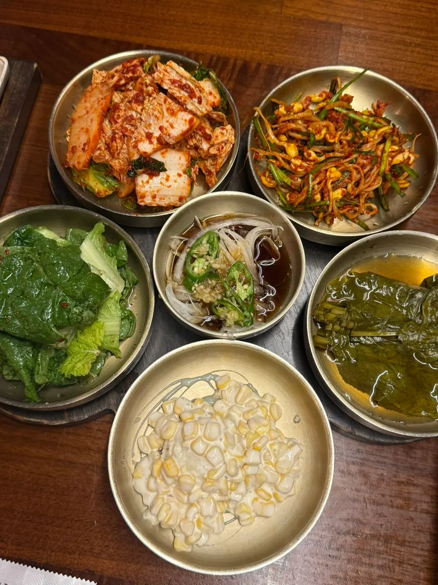 A full spread of Udontan's basic side dishes