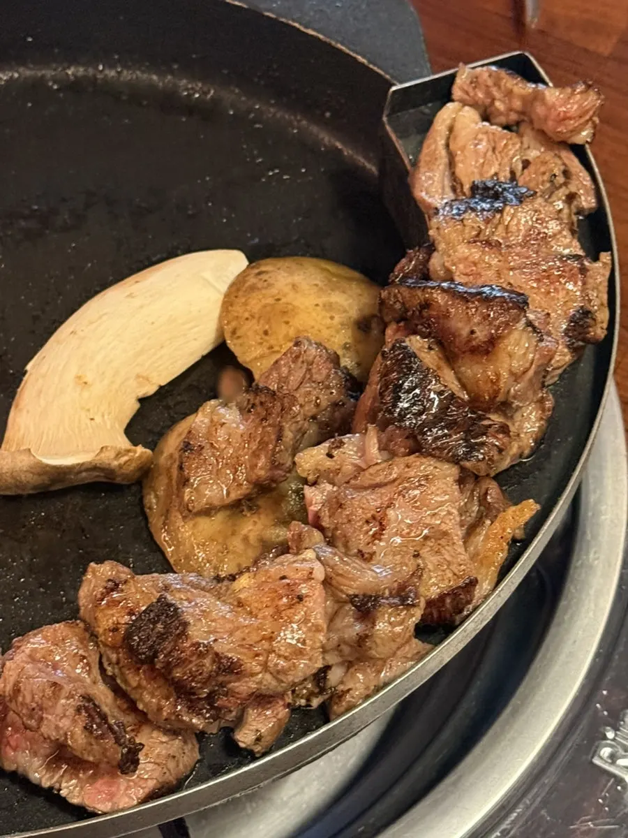 A piece of aged galbi dipped in salt