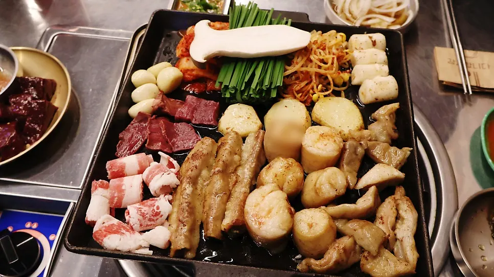 Mixed gopchang platter on the hot plate