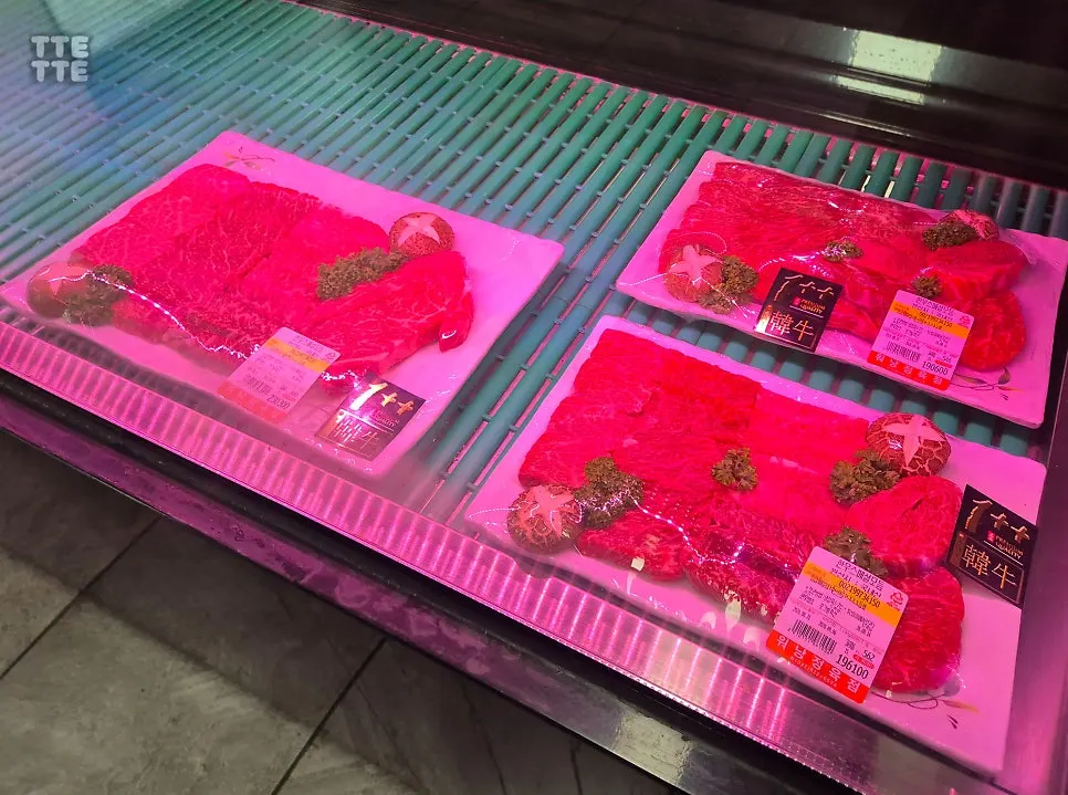 Butcher counter where you pick your own cuts of meat