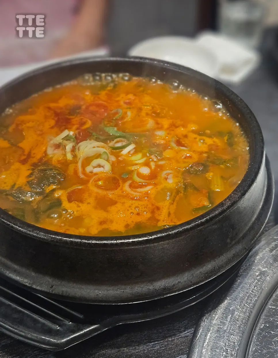 Doenjang jjigae served alongside the grilled meat